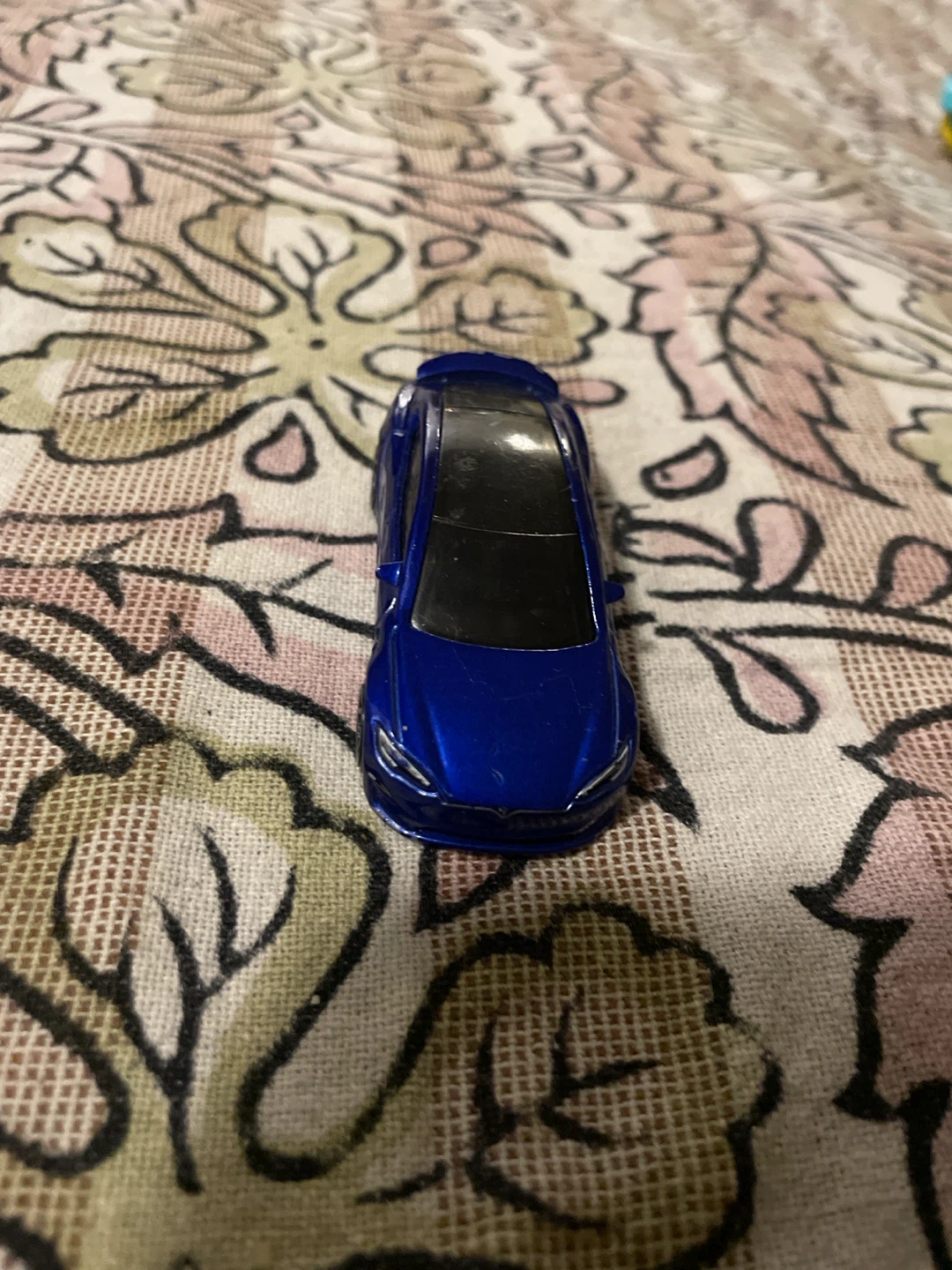 Blue Die-Cast Tesla Model S Toy Car