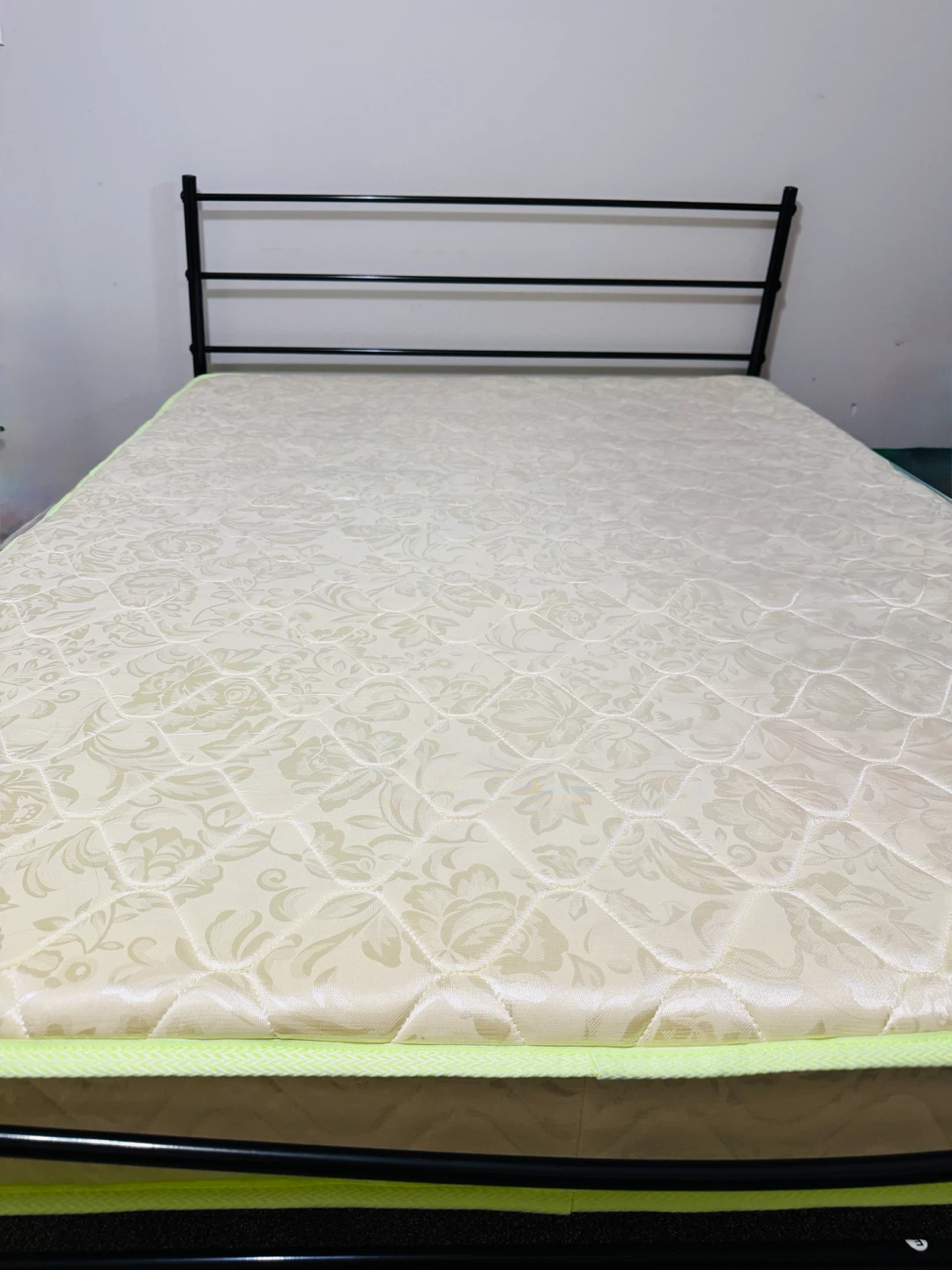 Double black metal bed frame and mattress
