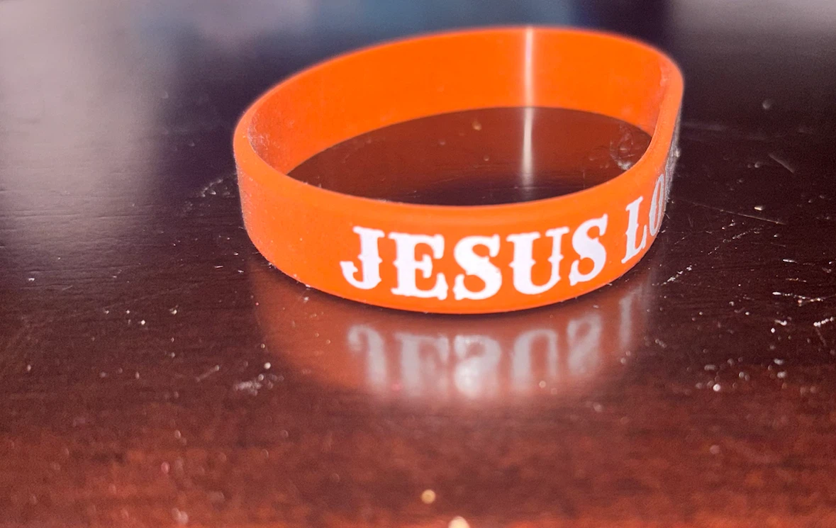 Orange "Jesus Loves You" Silicone Wristband