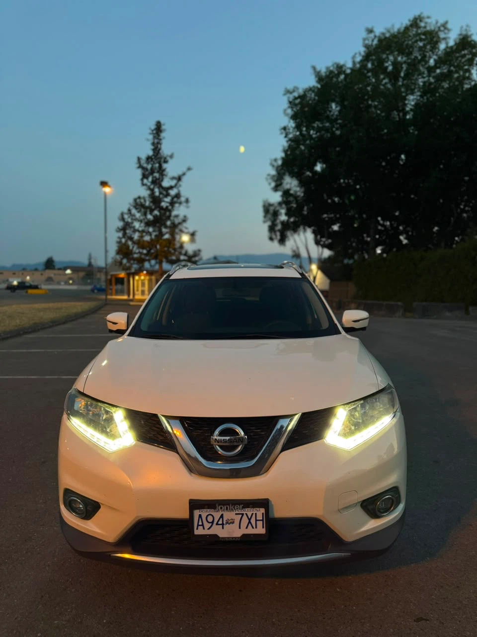 White Nissan Rogue SUV