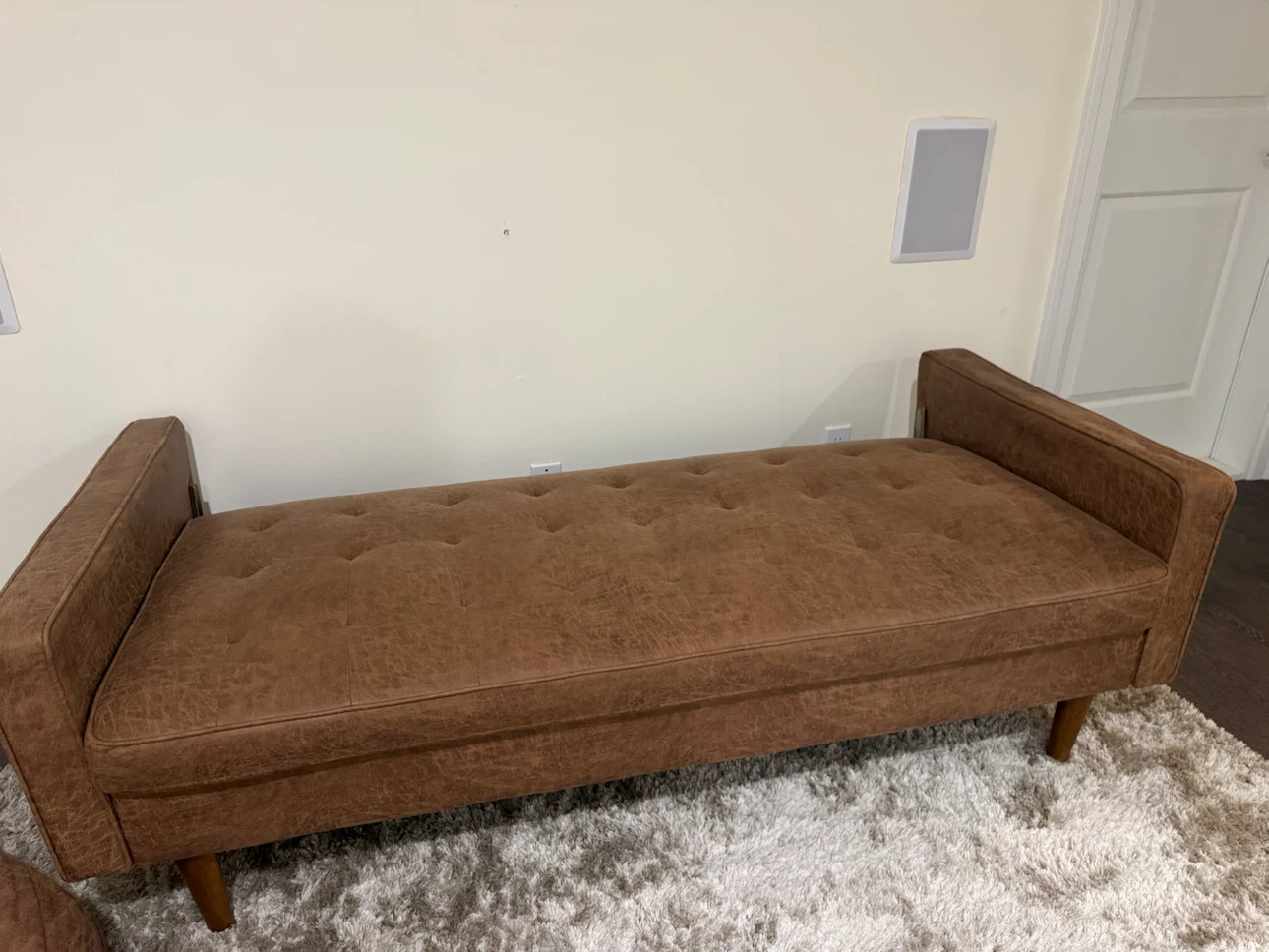 Brown Tufted Sofa with Round Bolster Arms