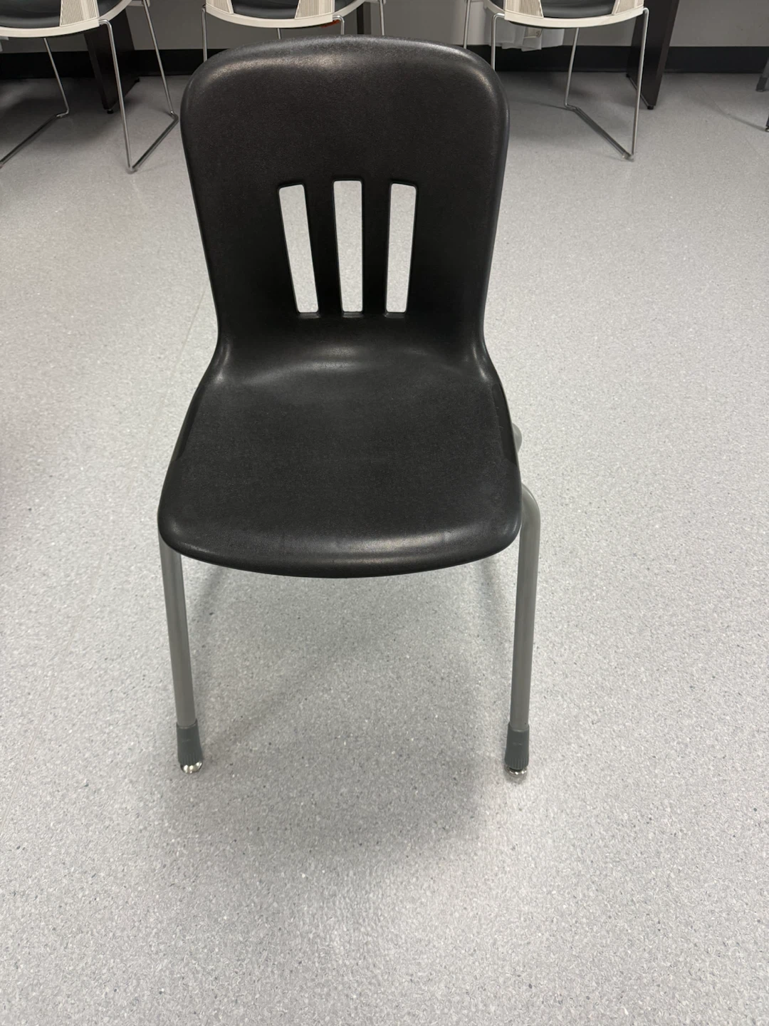 Black Plastic Chair with Grey Metal Legs
