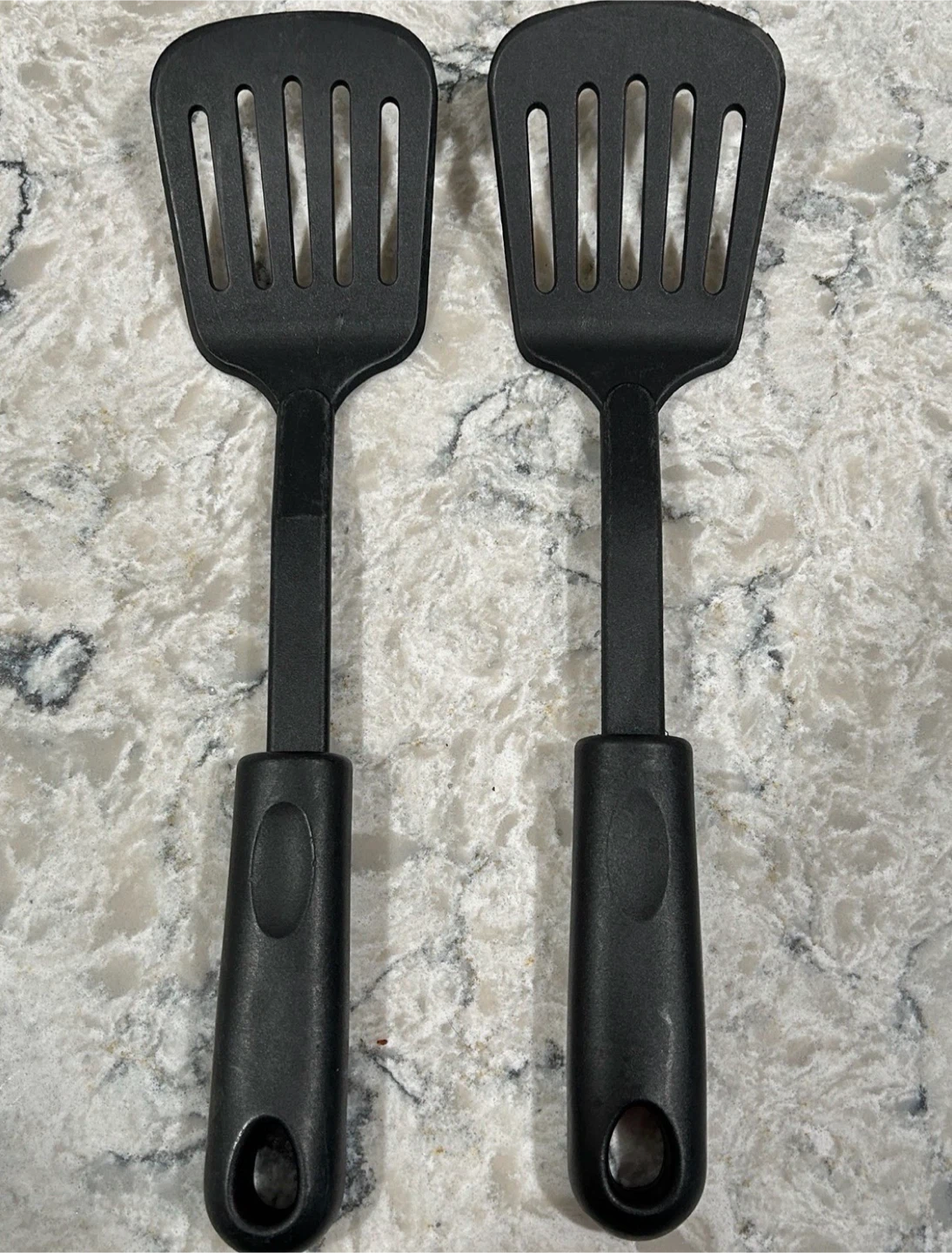 Two Black Slotted Spatulas