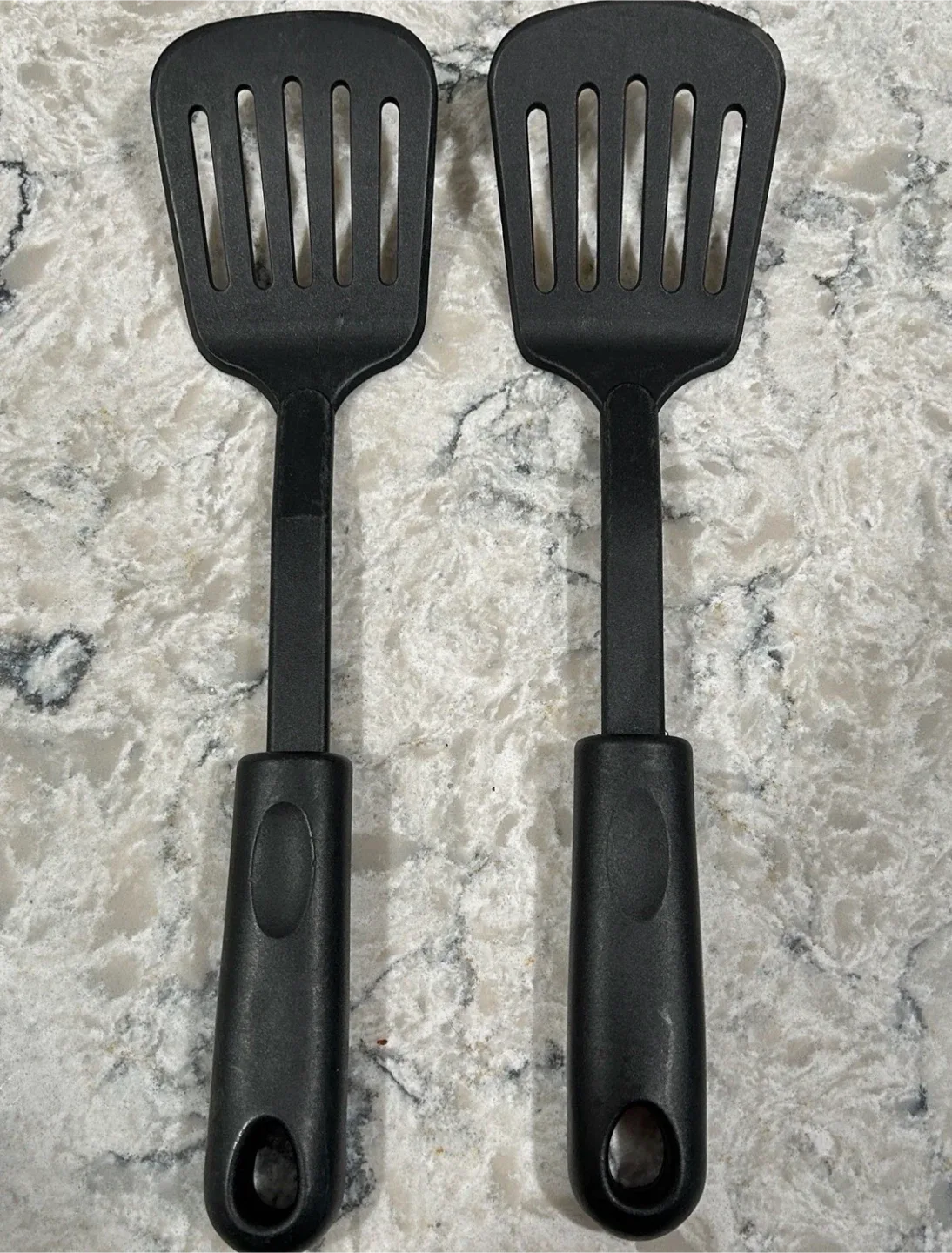 Two Black Slotted Spatulas