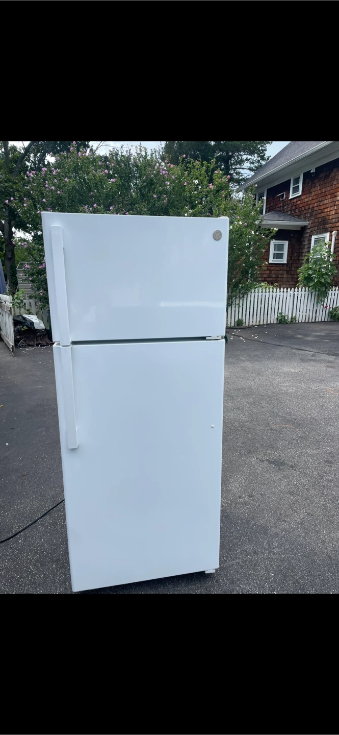 White GE  refrigerator 32wide 28 deep 69 high