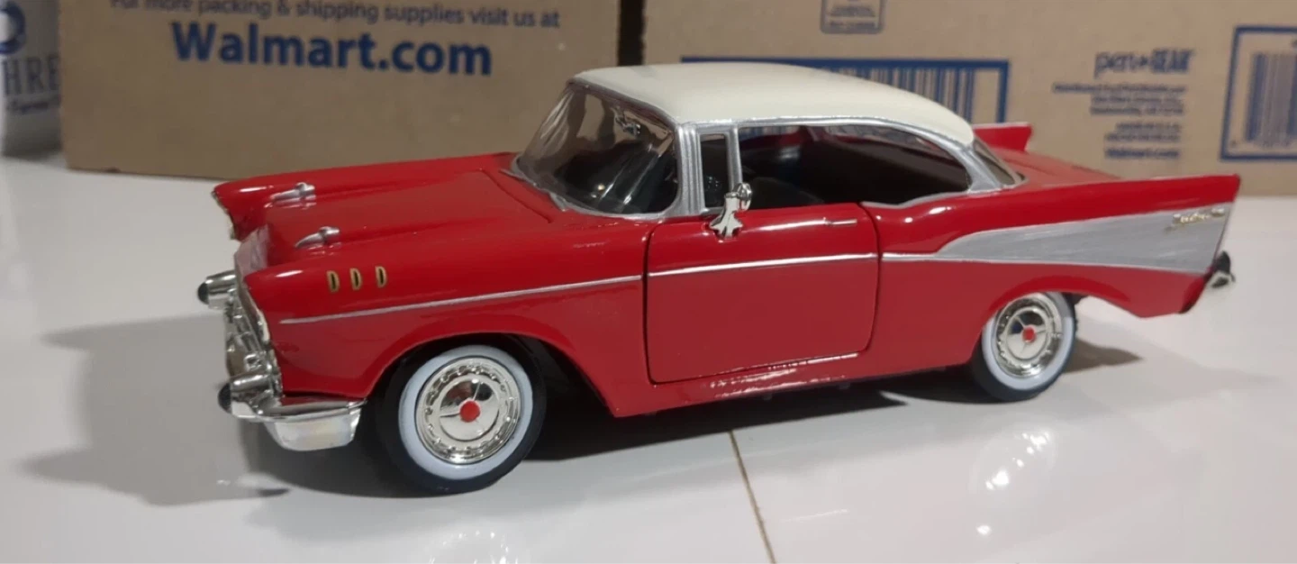 Red and White 1957 Chevrolet Bel Air Model Car
