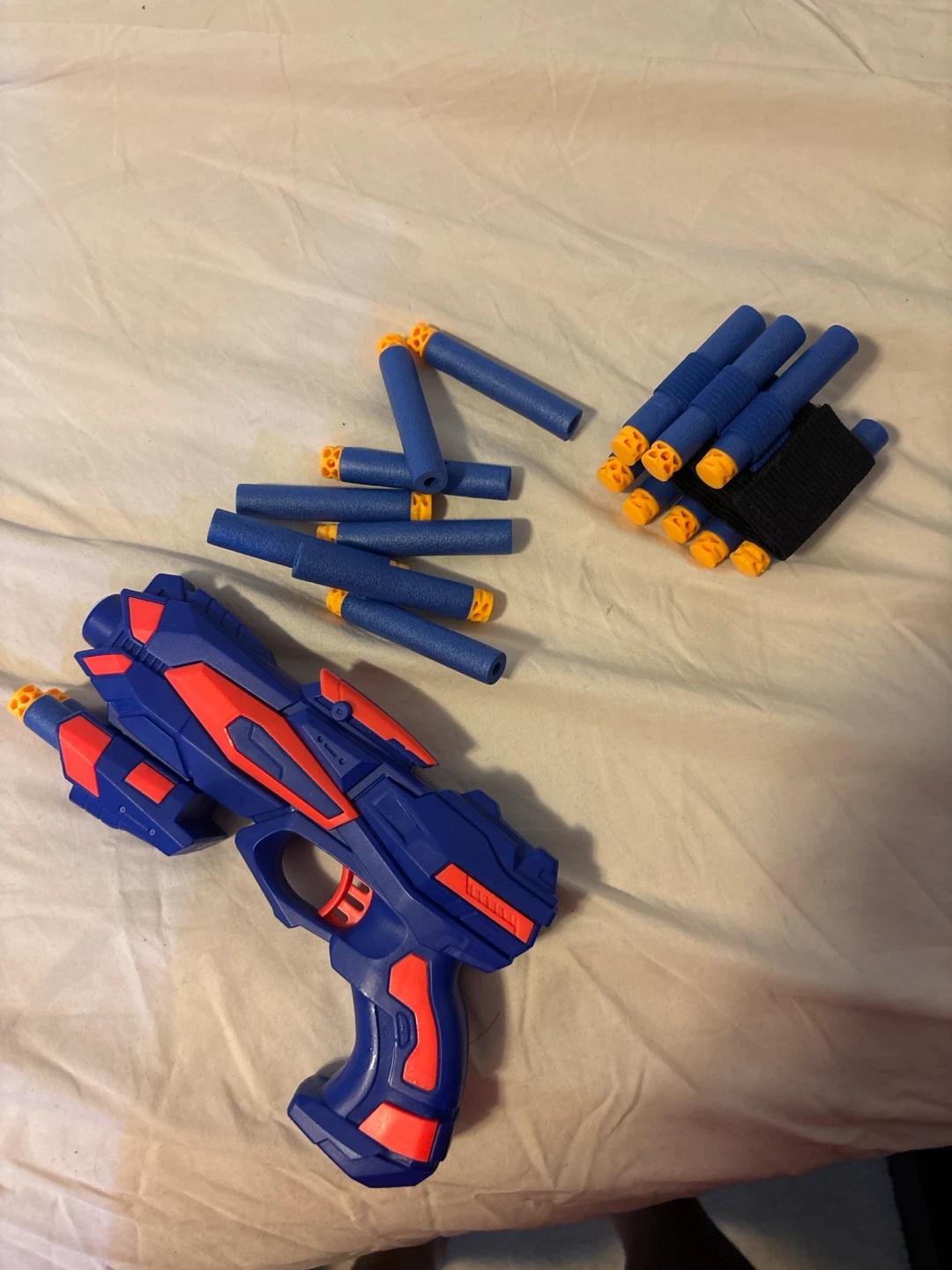 Blue and Orange Toy Blaster with Darts