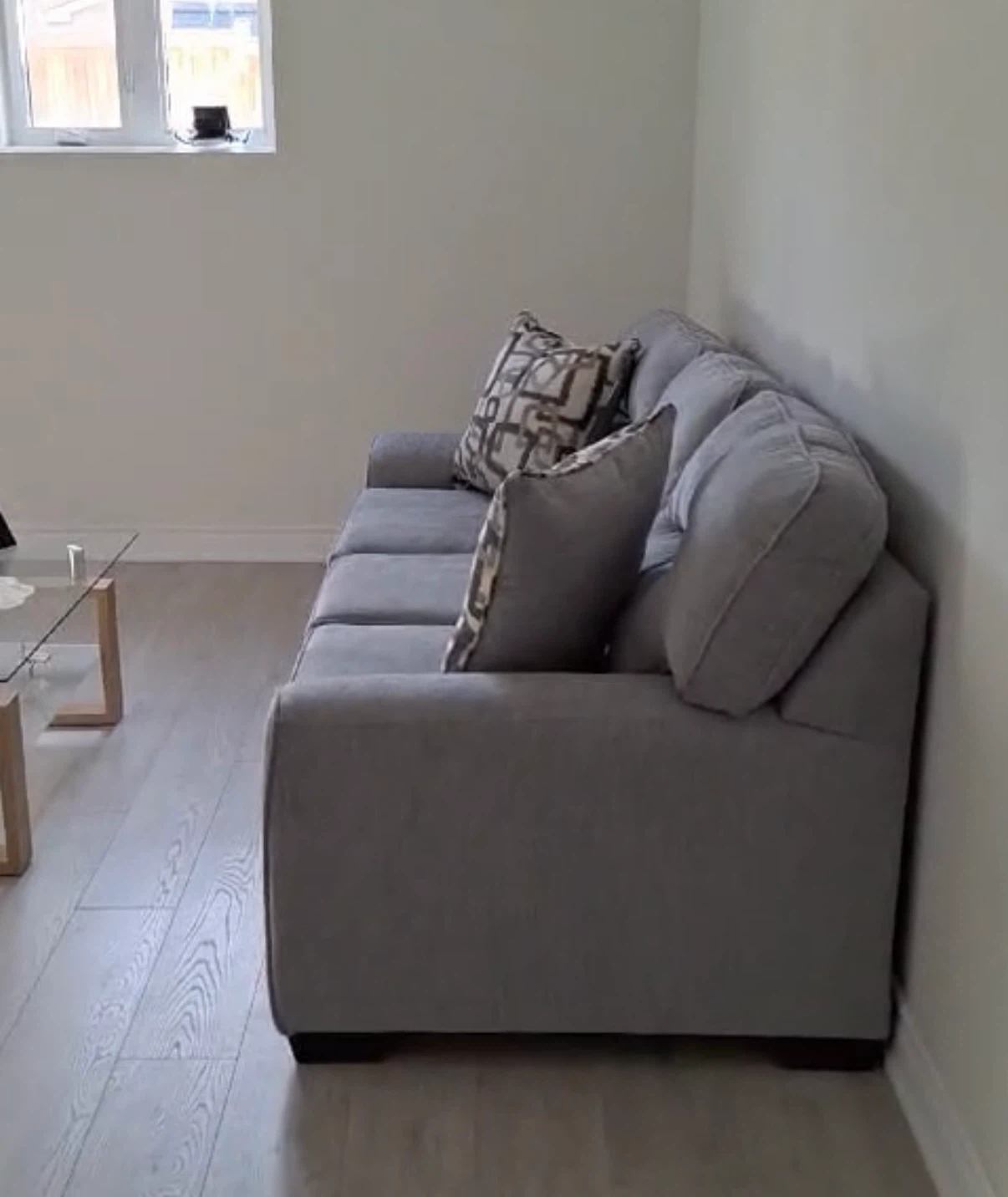 Grey Sofa with Decorative Pillows