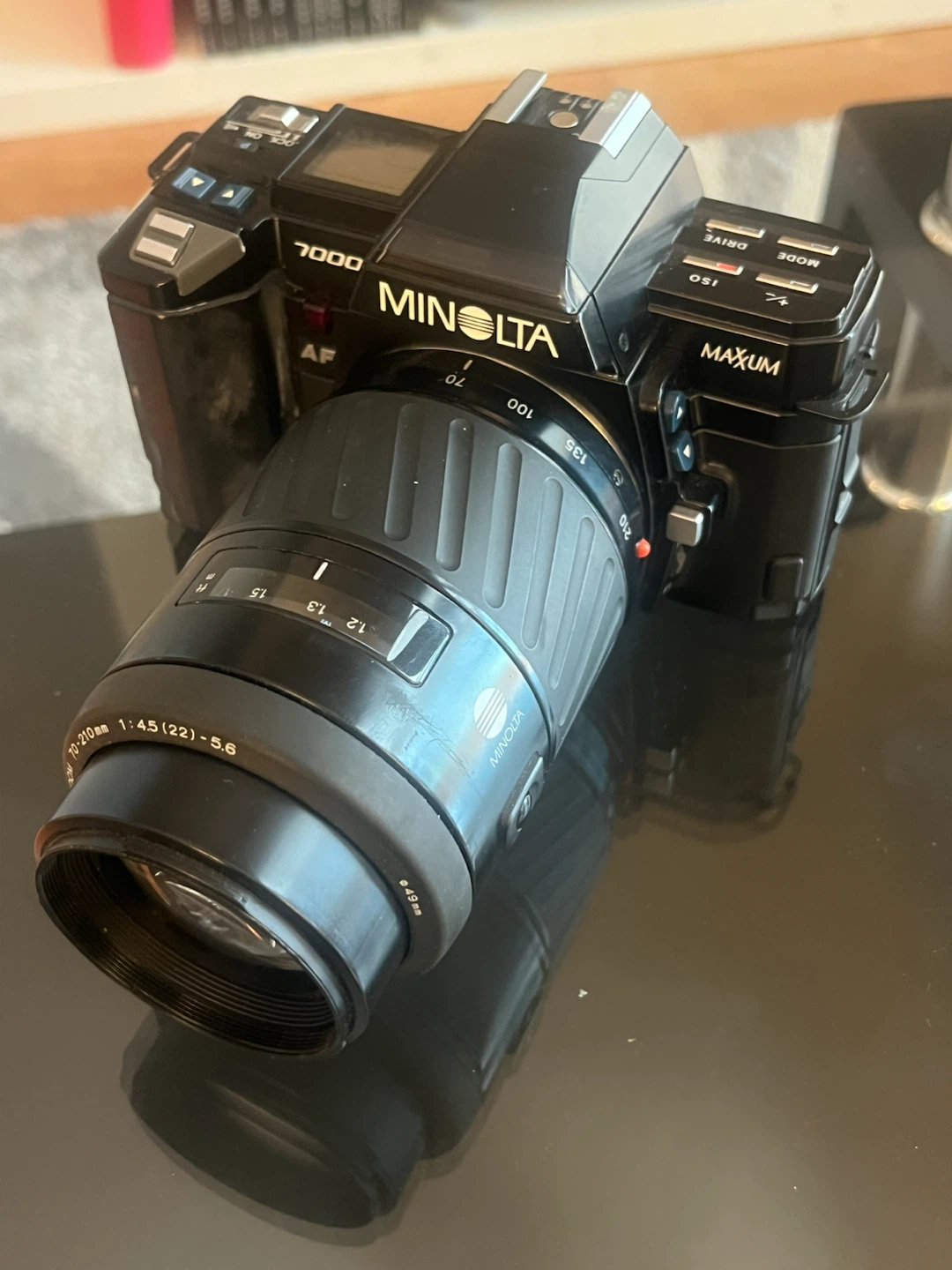 4 cameras and lenses with accesories