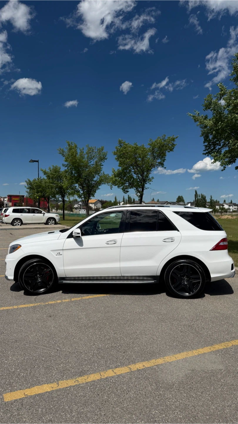White Mercedes-Benz ML 63 AMG SUV - photo 3