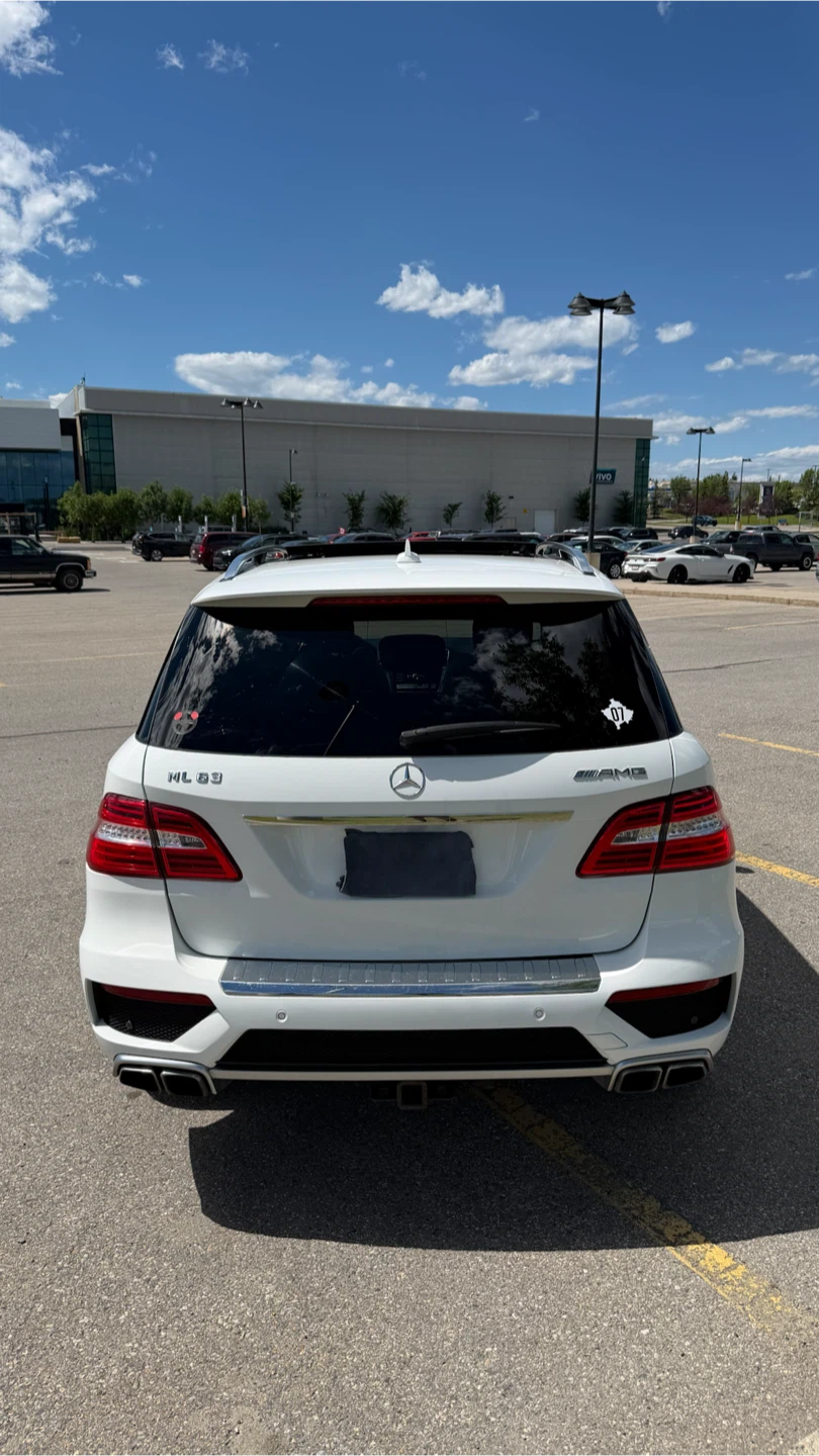 White Mercedes-Benz ML 63 AMG SUV - photo 4