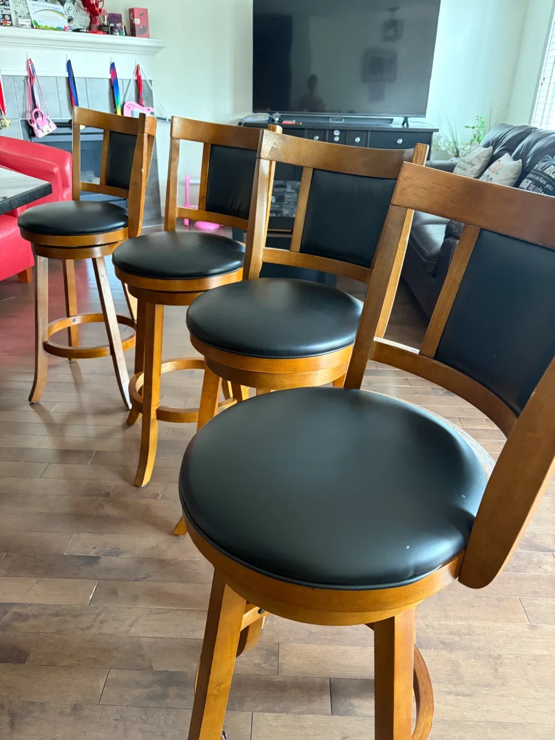Set of 4 Swivel Bar Stools - Wood and Black Vinyl