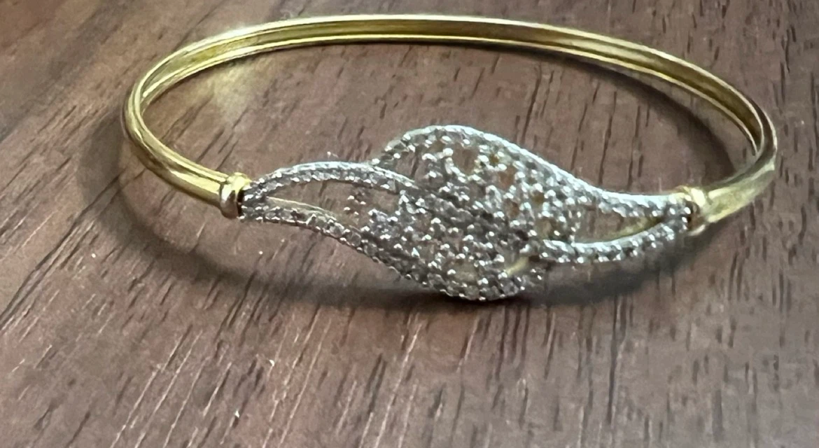 Gold tone and silver tone bangle