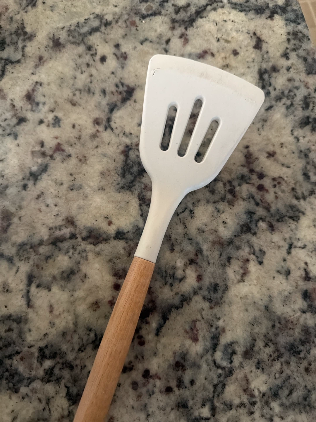 White Slotted Spatula with Wooden Handle