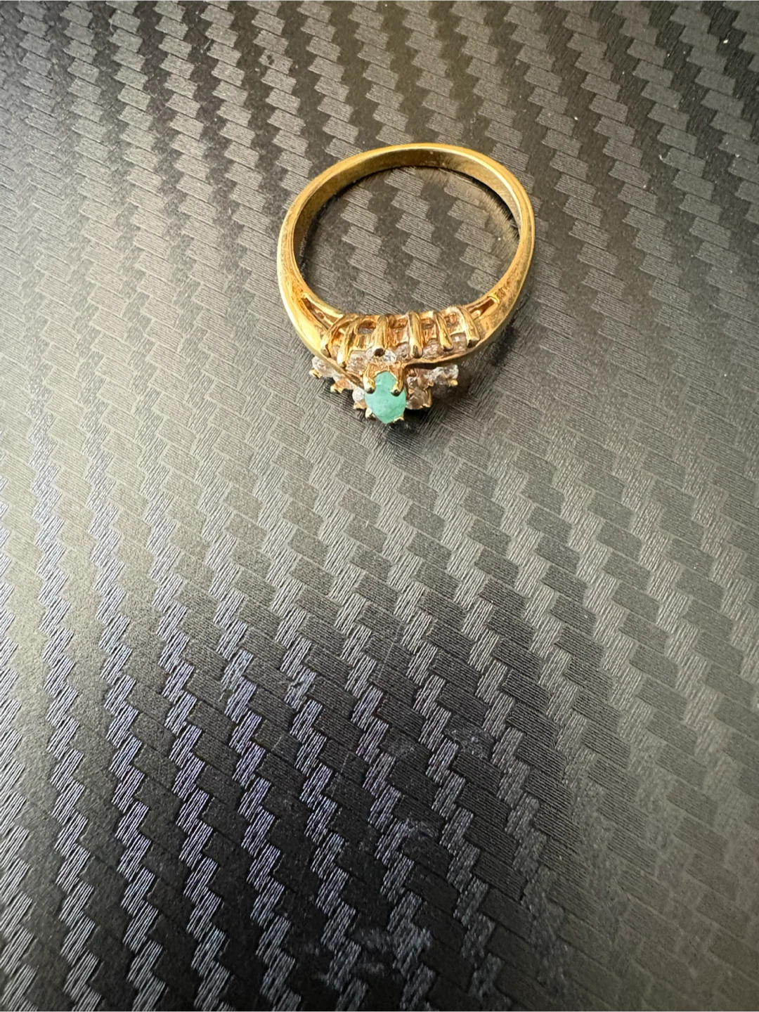Gold ring with emerald and diamonds