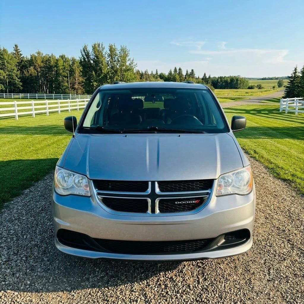 Silver Dodge Grand Caravan SXT Minivan