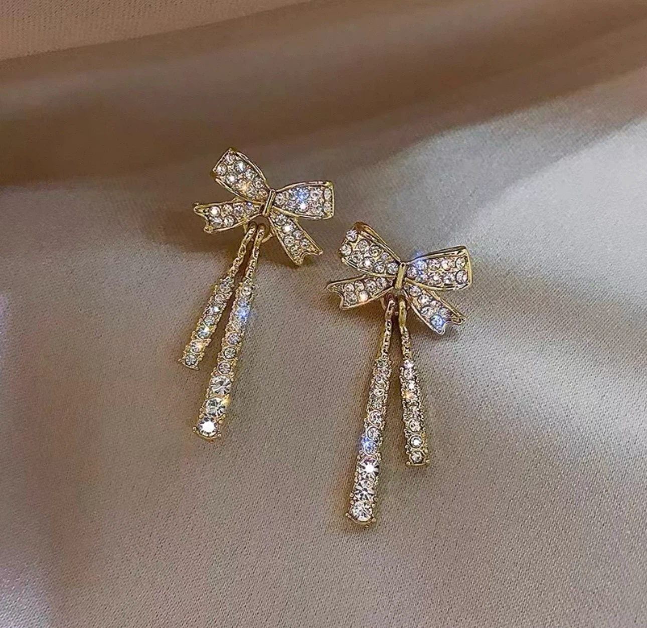 Gold Bow Drop Earrings with Rhinestones