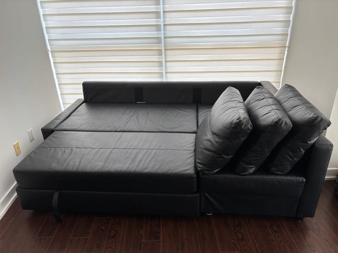 IKEA FRIHETEN black leather corner sofa with built-in storage - photo 2