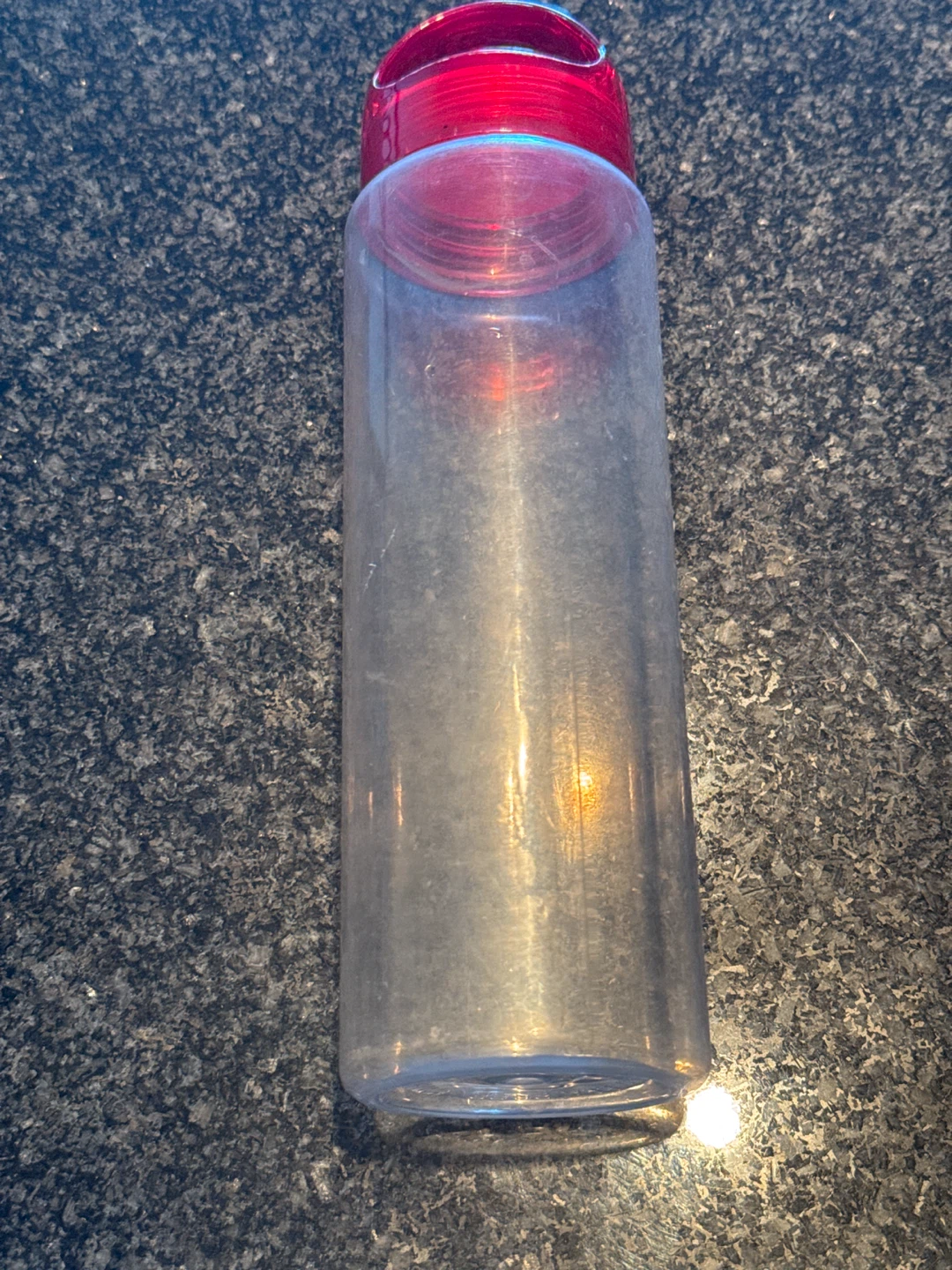 Plastic Water Bottle with Red Lid
