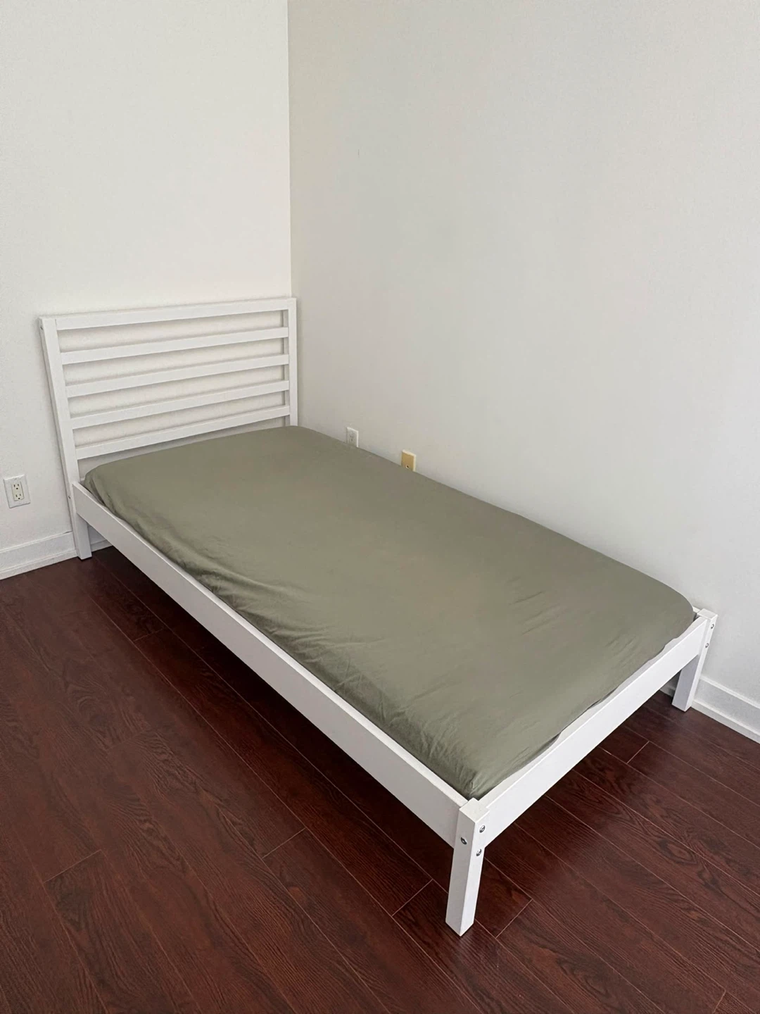 IKEA TARVA twin-sized white bed frame with mattress