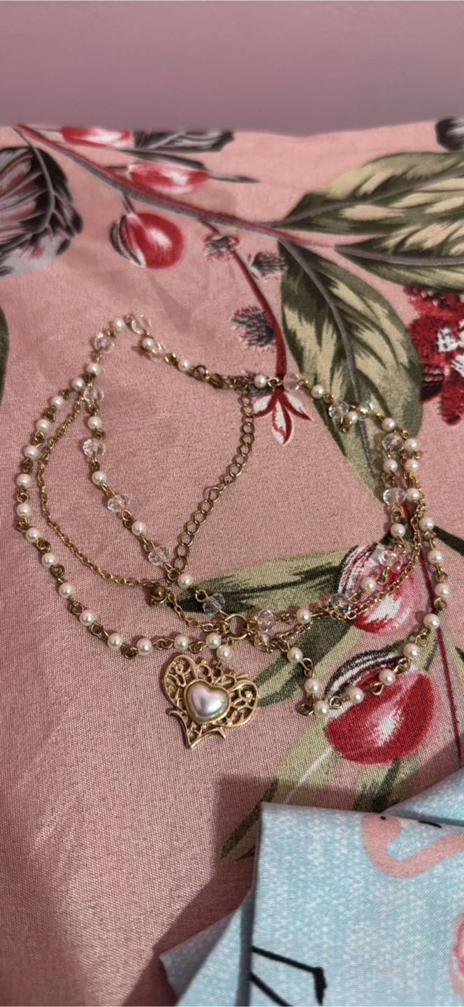 Gold-tone multi-strand necklace with heart pendant