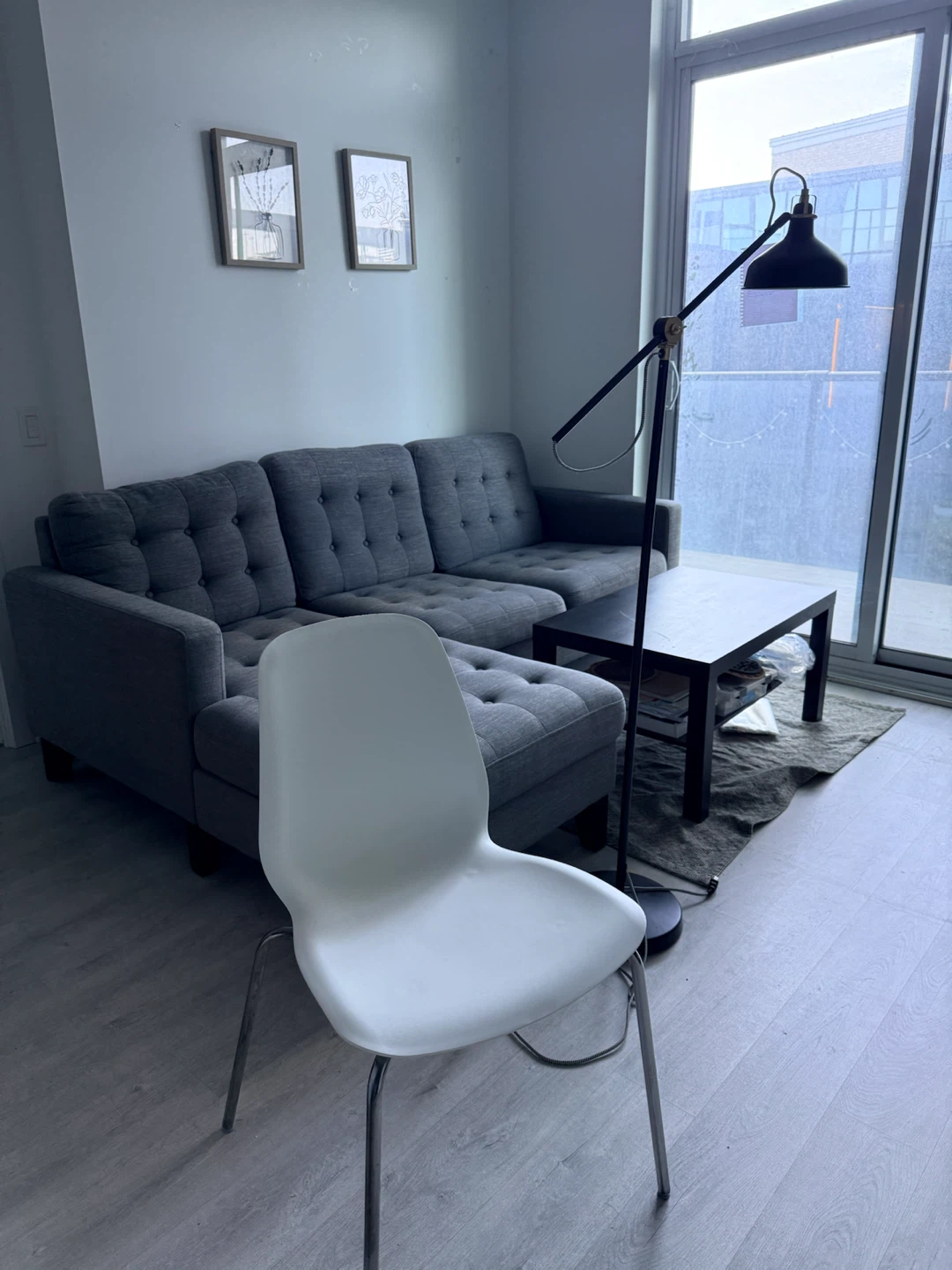 MOVE OUT SALE- Sofa+ IKEA table+ IKEA chairs+ lamp+ Rug+ Frames