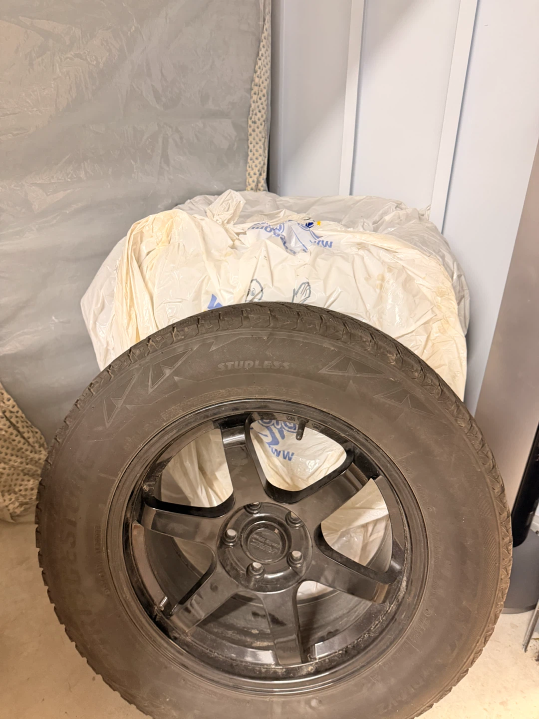 Bridgestone Studless Winter Tire on Black Rim - photo 3