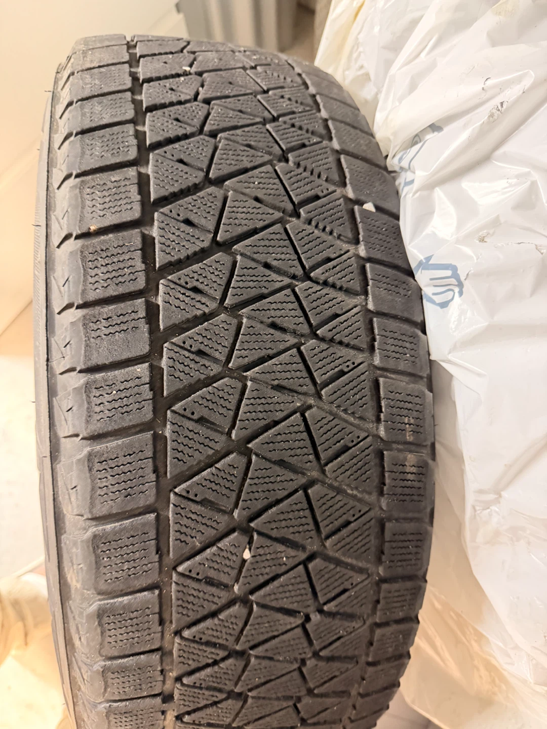 Bridgestone Studless Winter Tire on Black Rim - photo 4