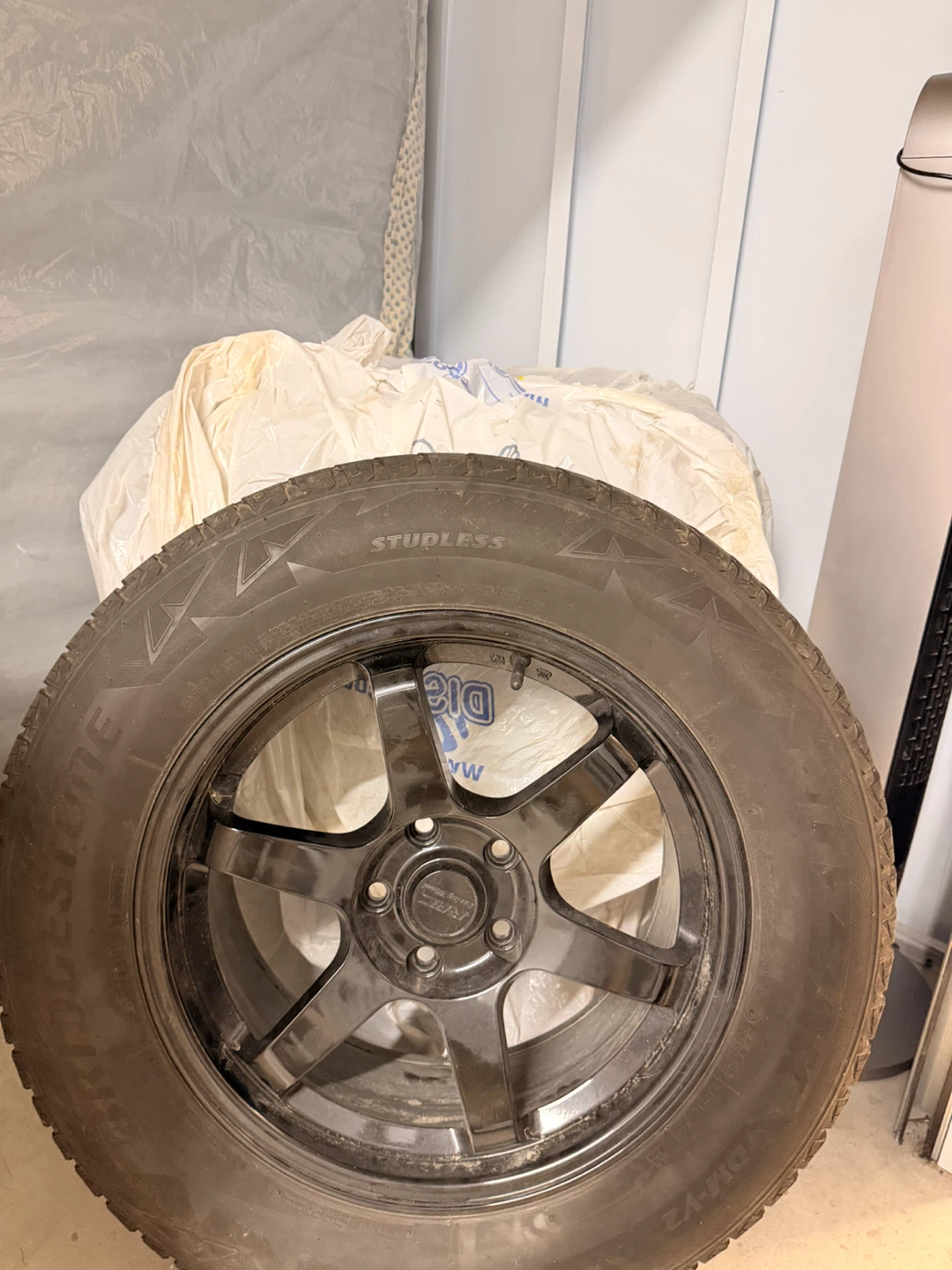 Bridgestone Studless Winter Tire on Black Rim - photo 5