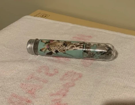 Decorative storage tube with giraffe print