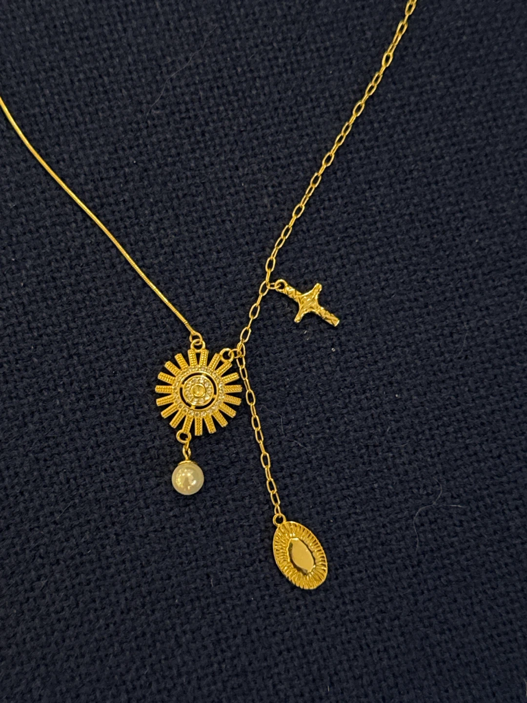 Gold Tone Necklace with Sun, Pearl, Oval, and Cross Charms - photo 2