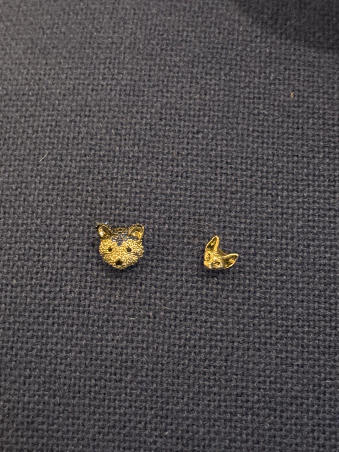 Gold coloured animal stud earrings