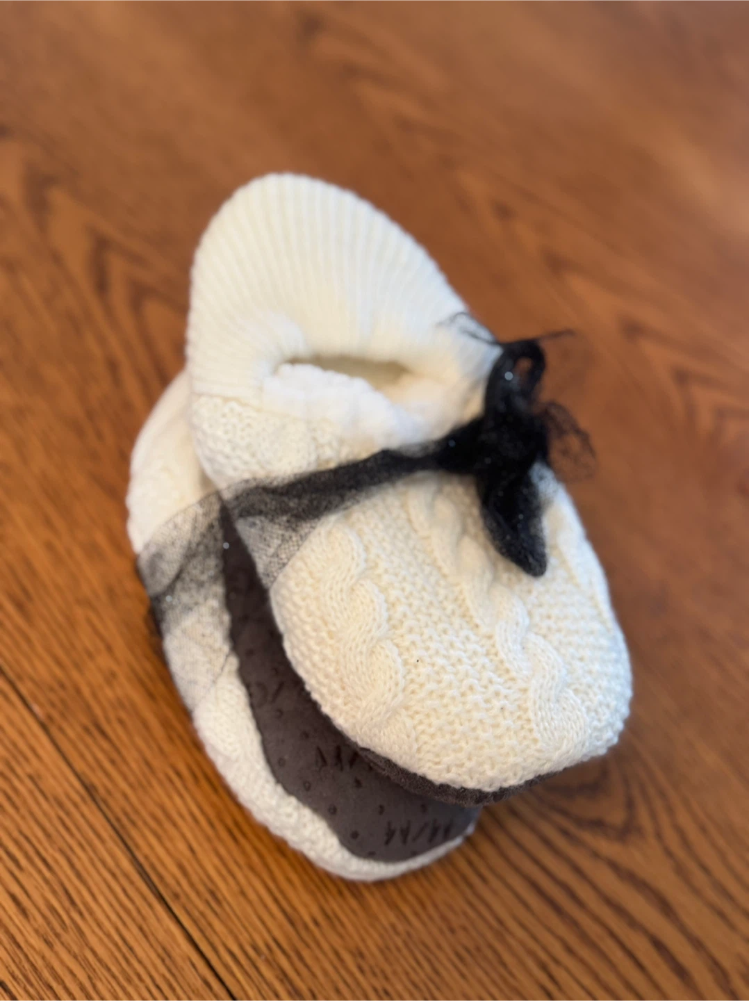 Cream Cable Knit Slippers with Black Bow