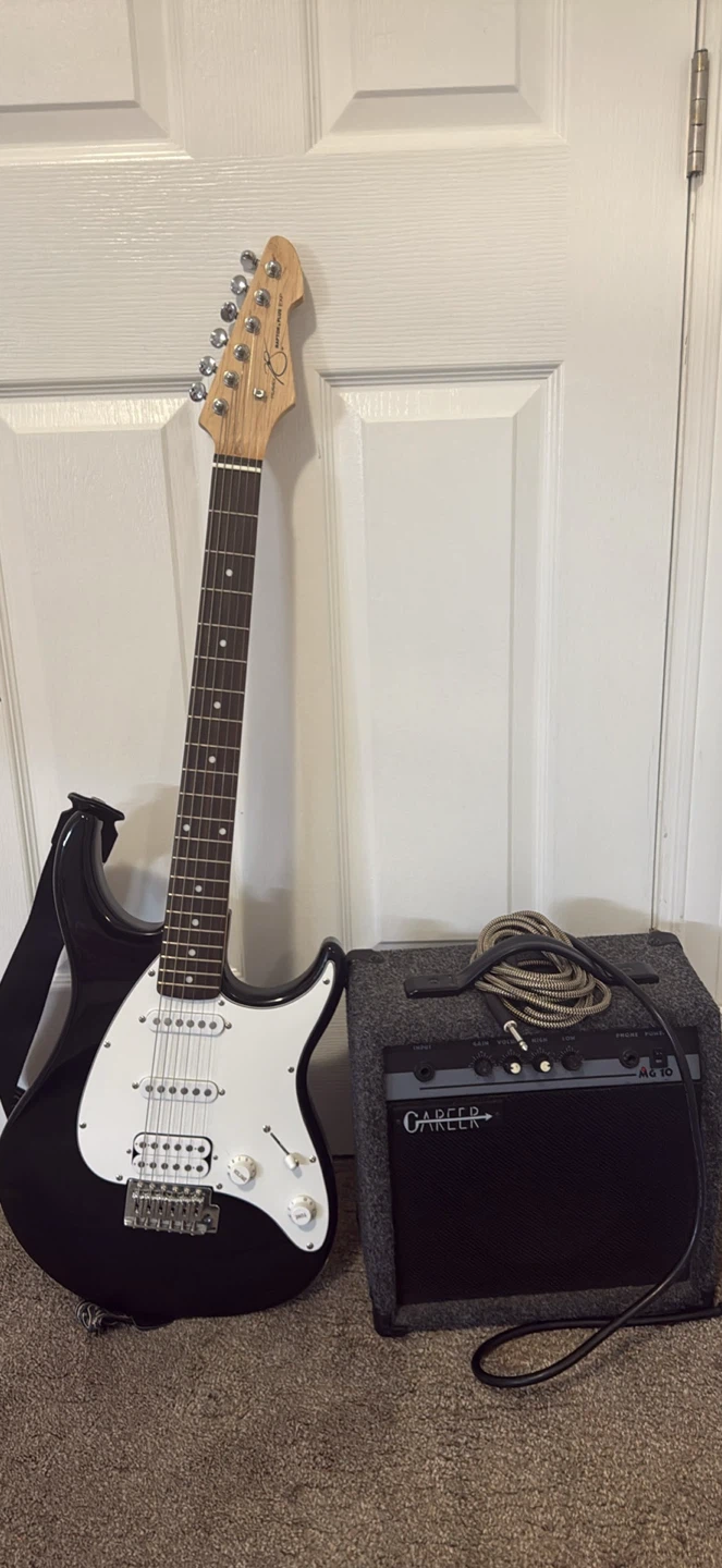 Electric guitar with amplifier