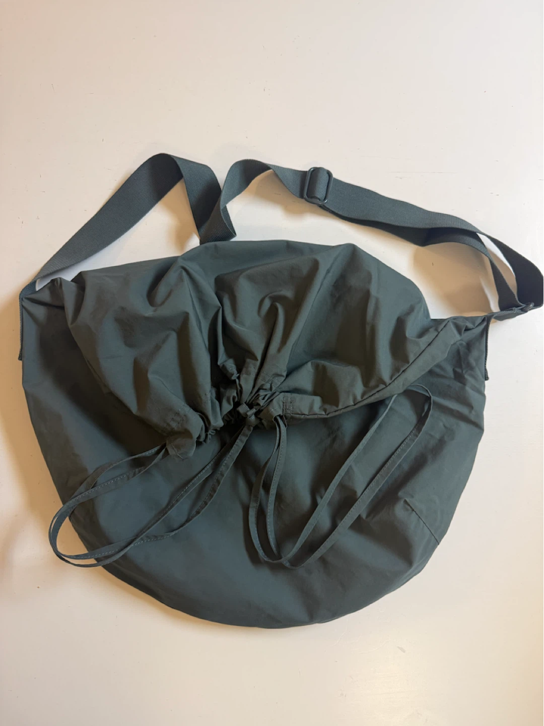 Uniqlo messenger bag