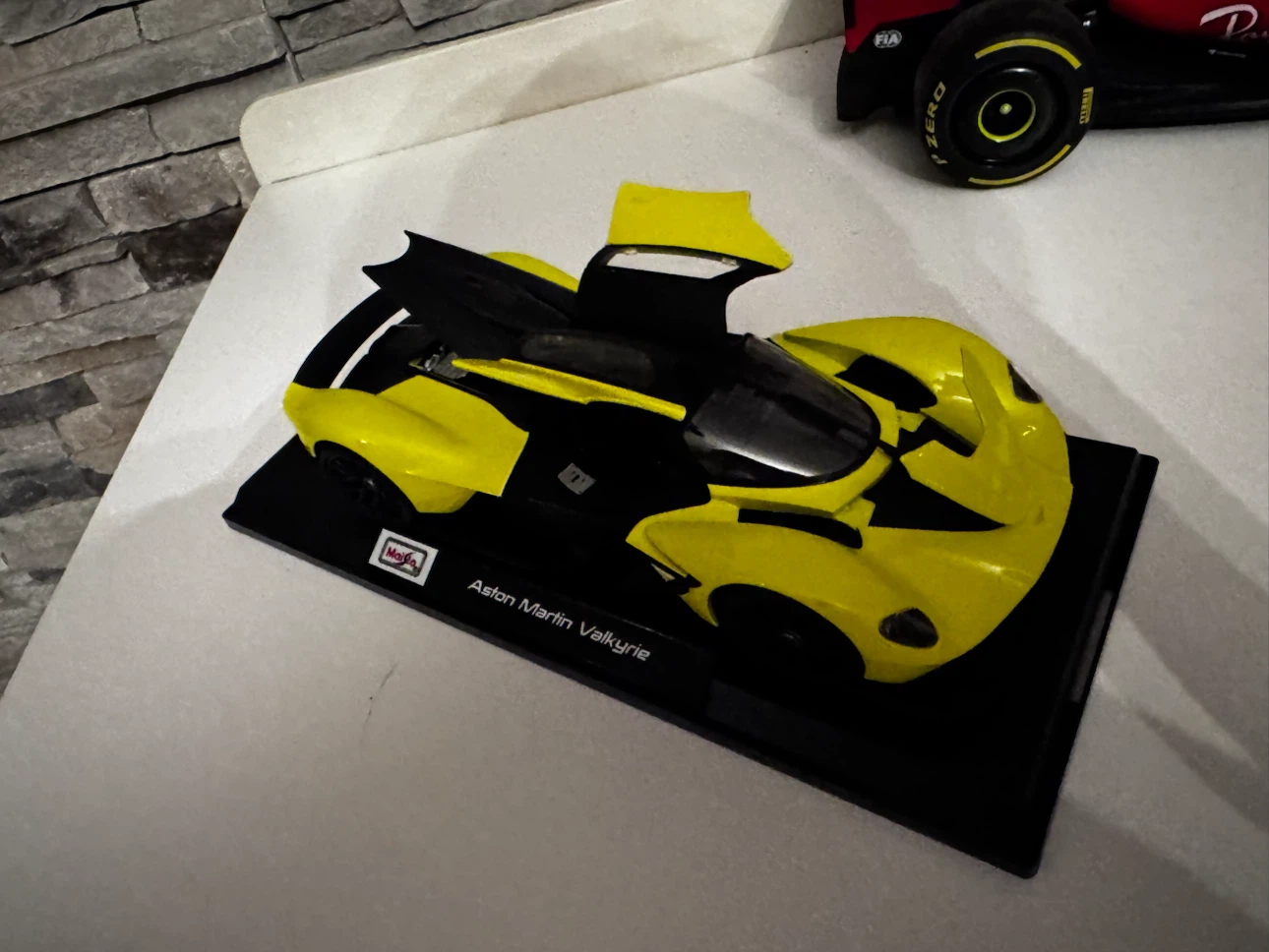 Maisto Aston Martin Valkyrie Model Car - Yellow/Black