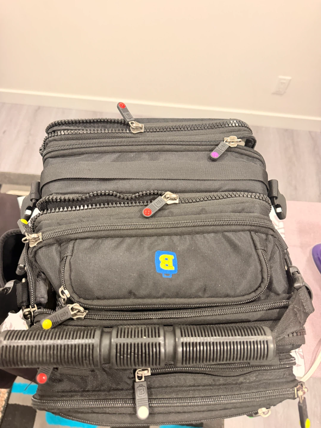 Black "B" Logo Bag with Multiple Compartments
