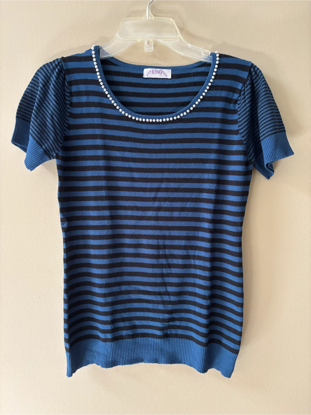 Free women’s sweater with pearl detail