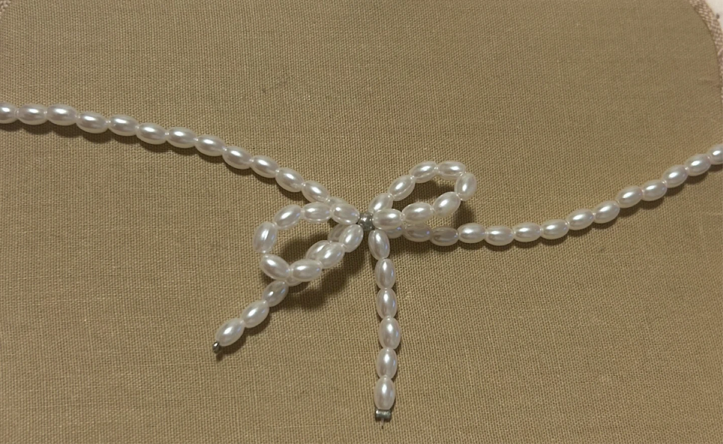 White Faux Pearl Bow Necklace