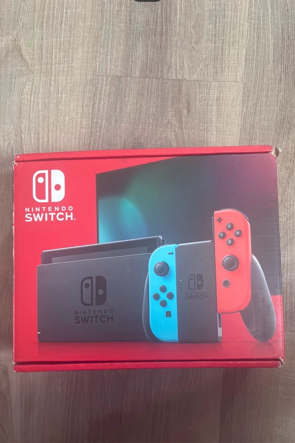 Nintendo Switch Console with Neon Red and Blue Joy-Cons