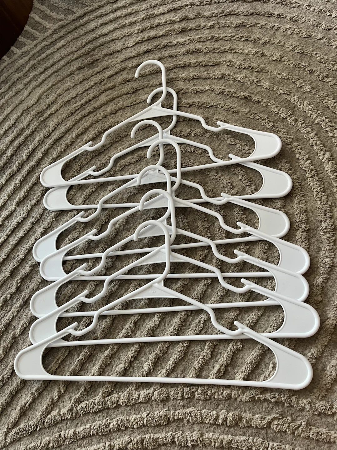 Set of 7 White Plastic Clothes Hangers