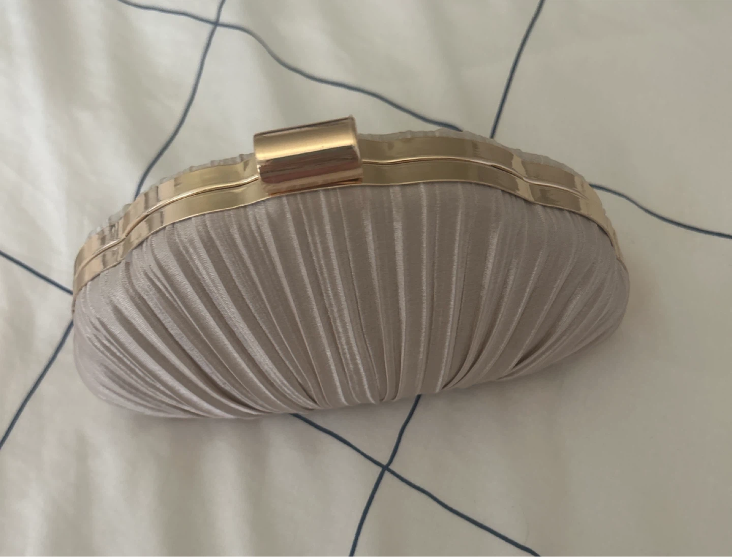 Pleated clutch purse with gold hardware