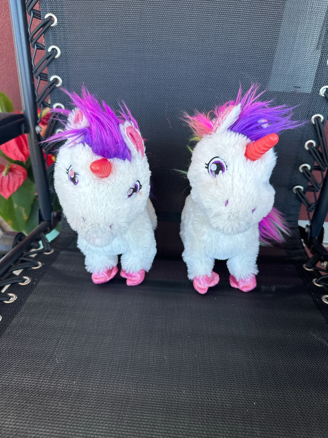 Two Plush Unicorn Toys