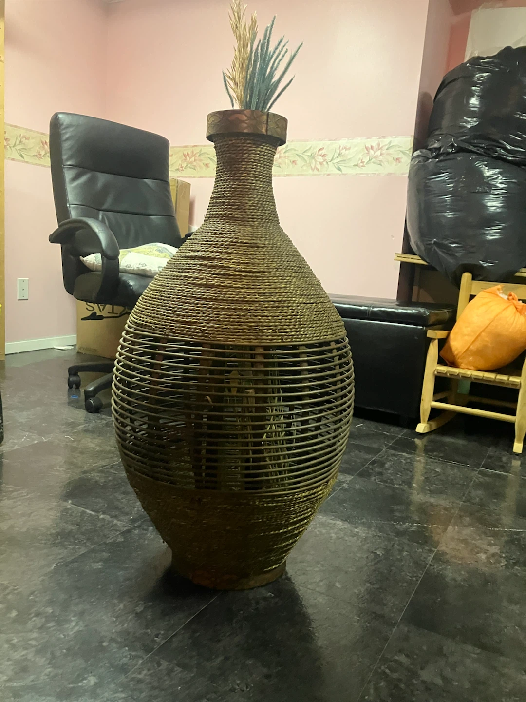 Large decorative vase with dried grass accents