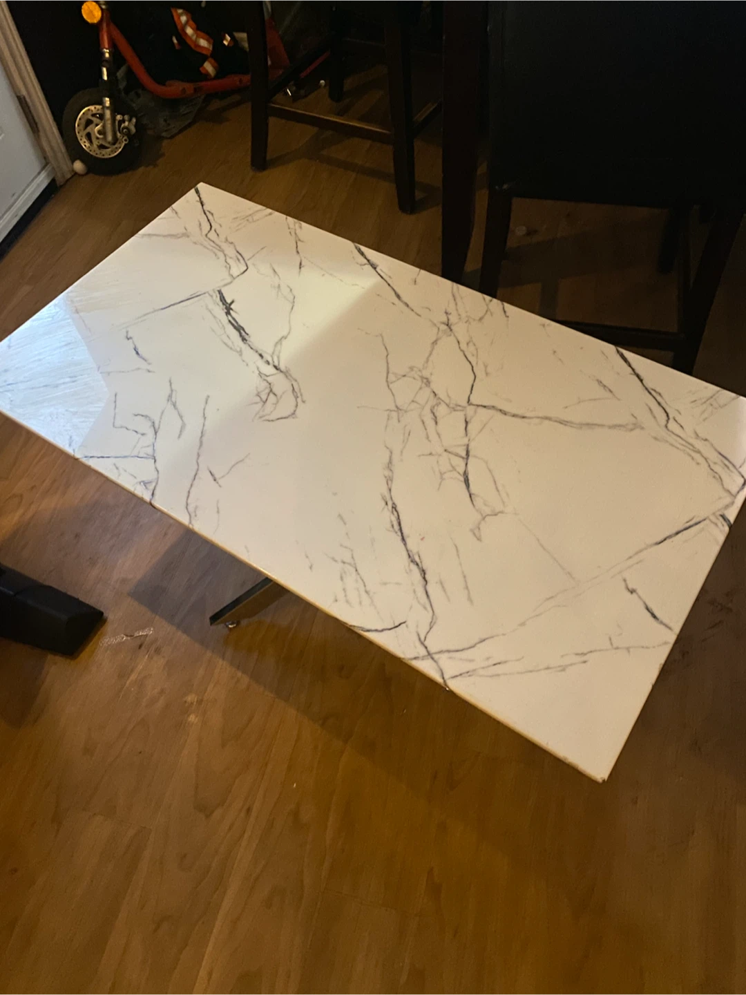 Glass coffee table with marble design