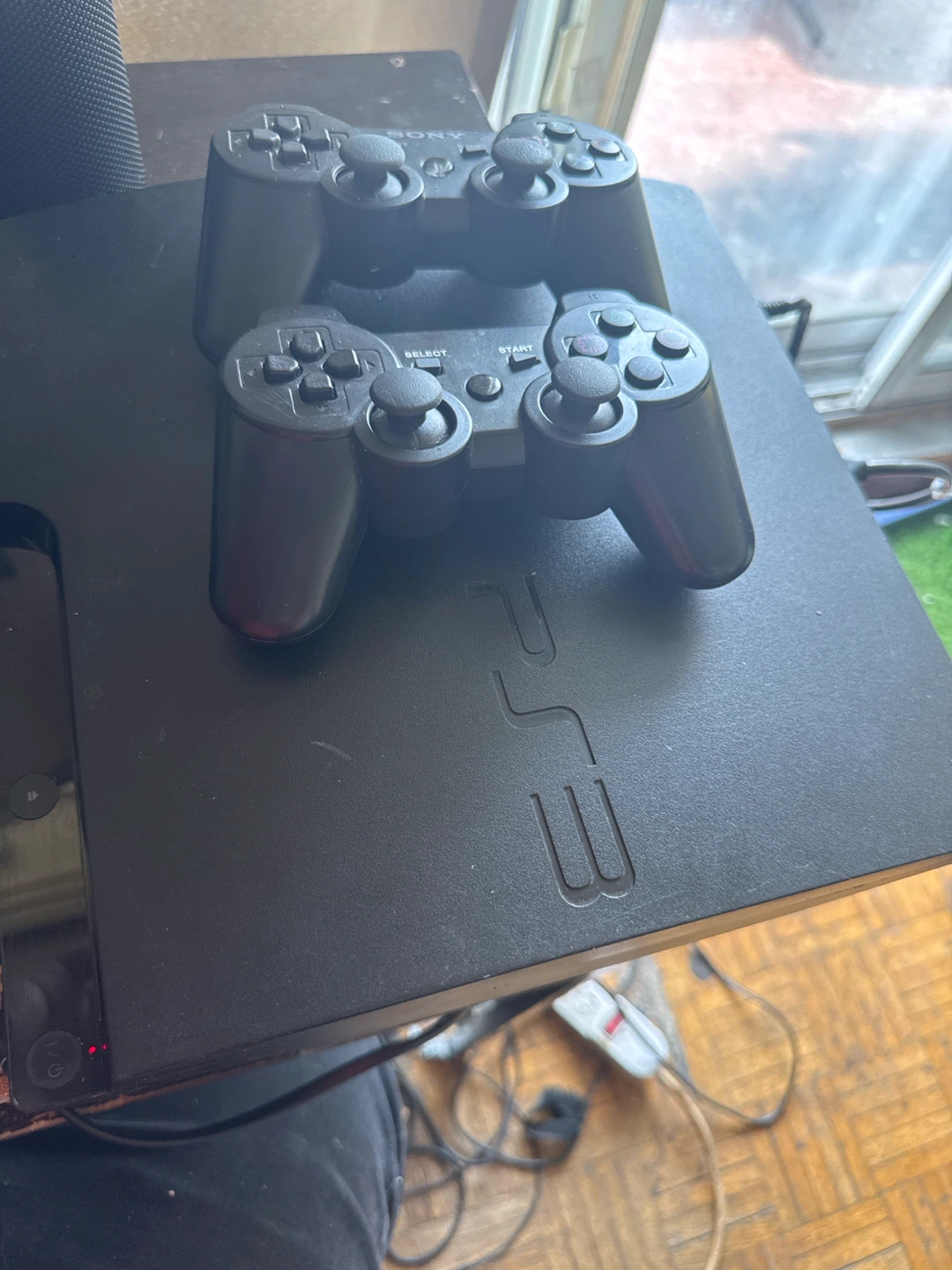 PlayStation 3 Console with Games and Controllers