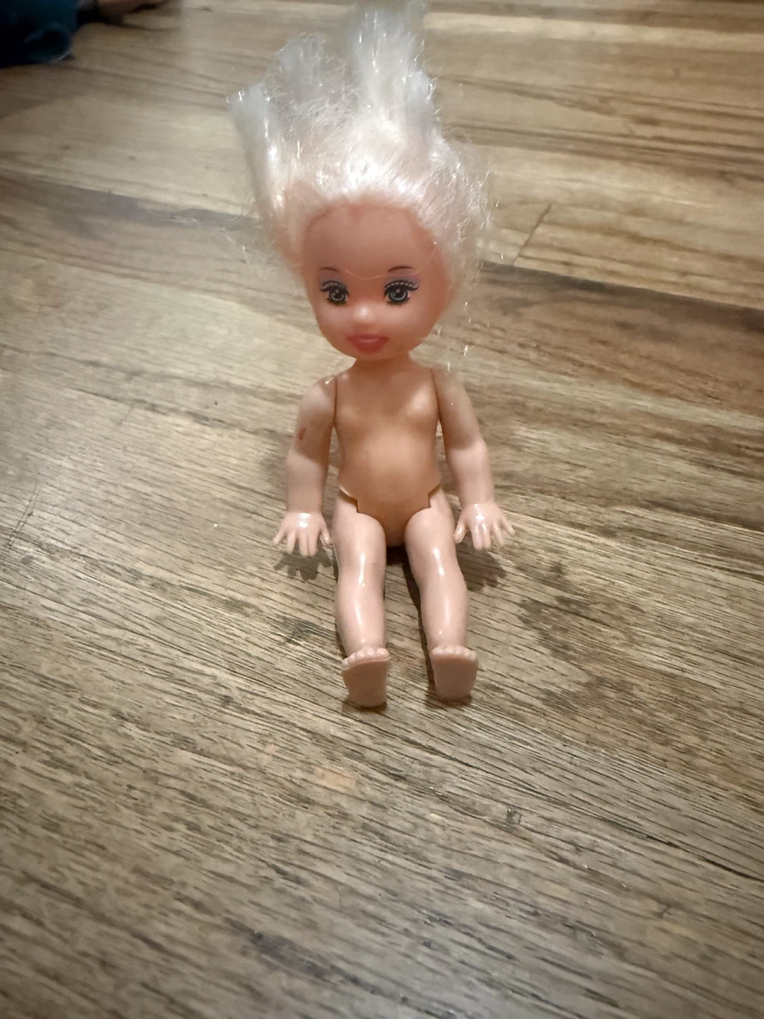 Small blonde doll