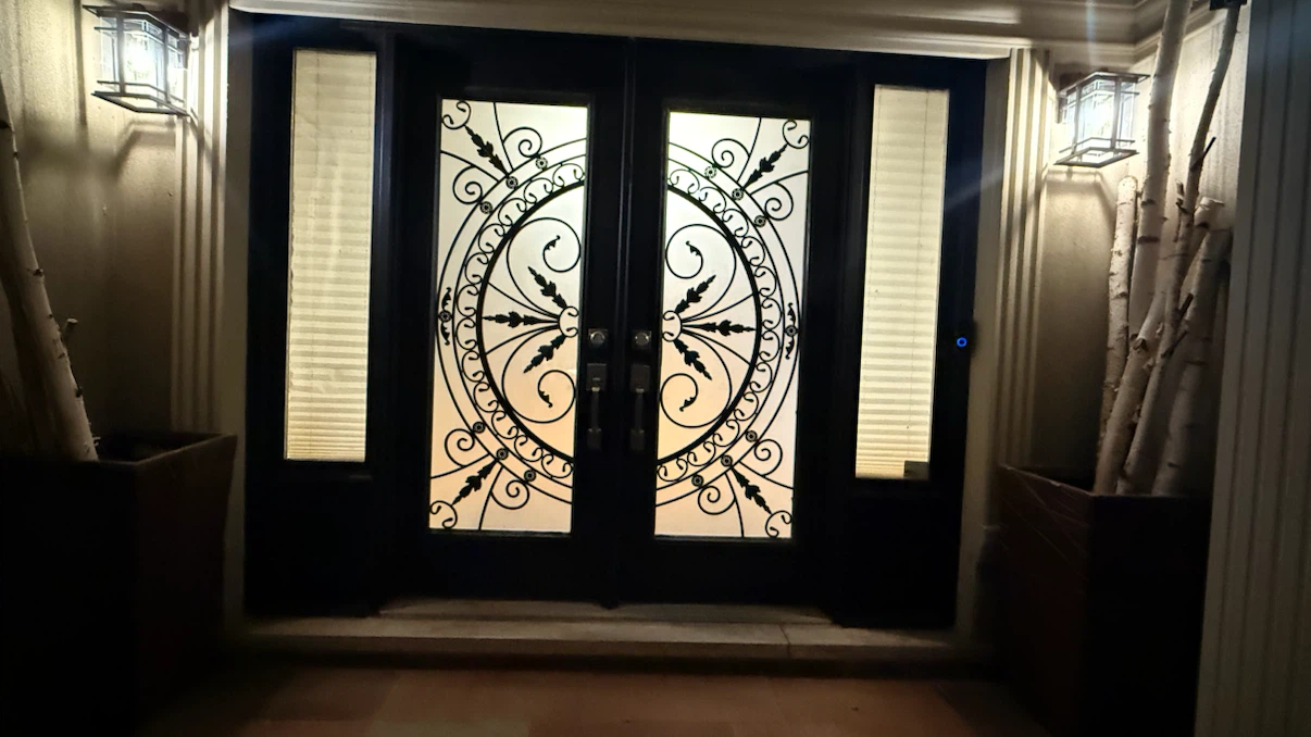 Double Entry Doors with Decorative Wrought Iron - photo 3