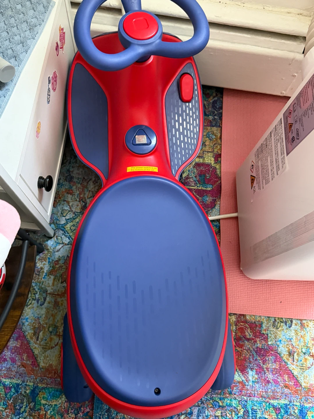Red and Blue Ride-On Toy Car