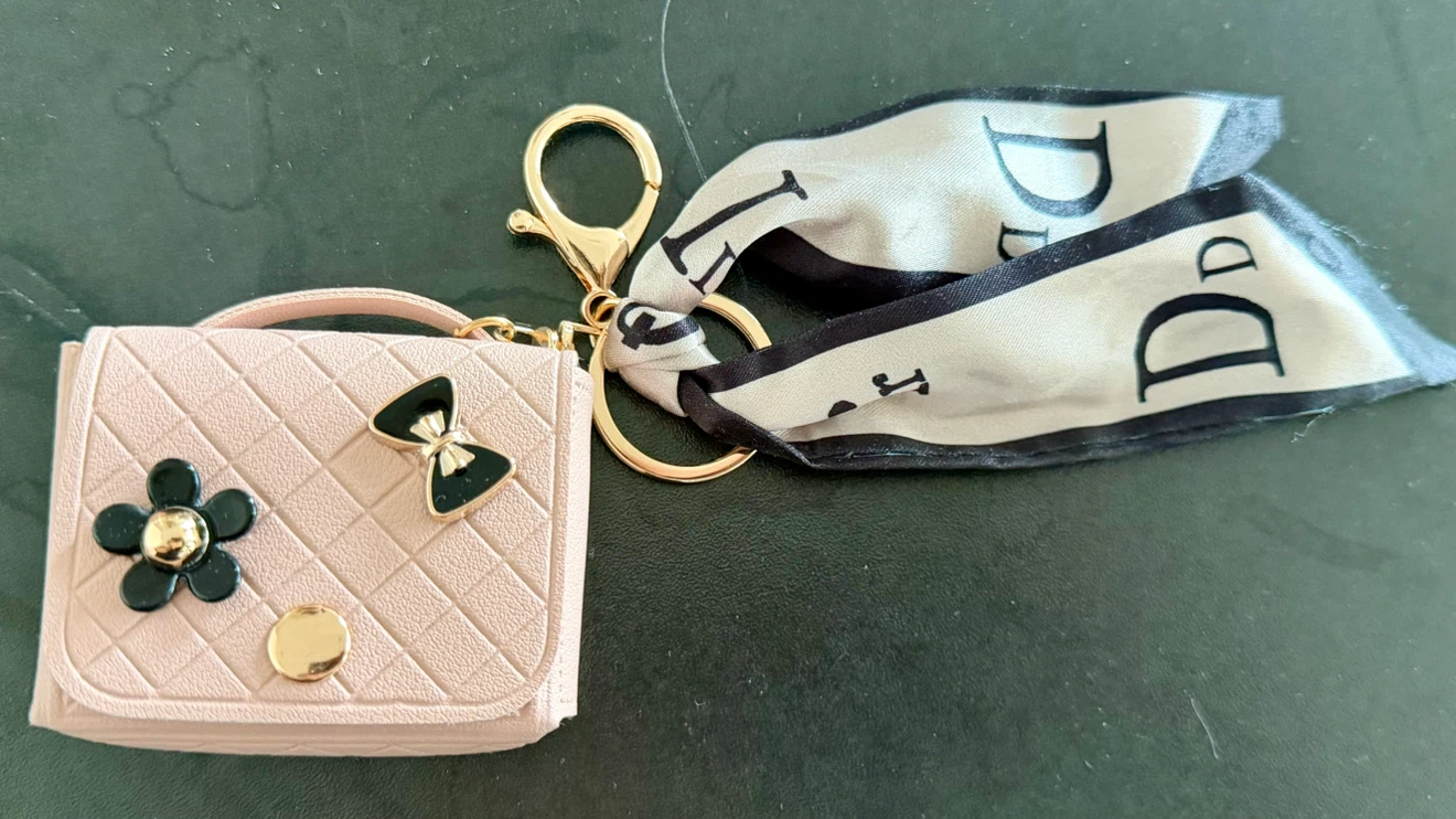 Pink airpod case or bag keychain charm